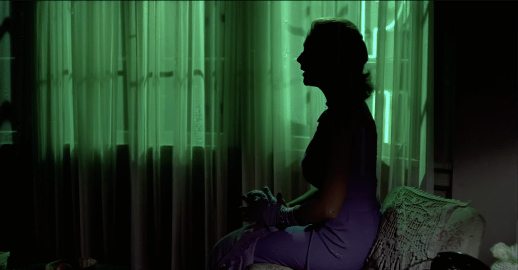 "Judy" awash in ghostly green in Hitchcock's Vertigo.